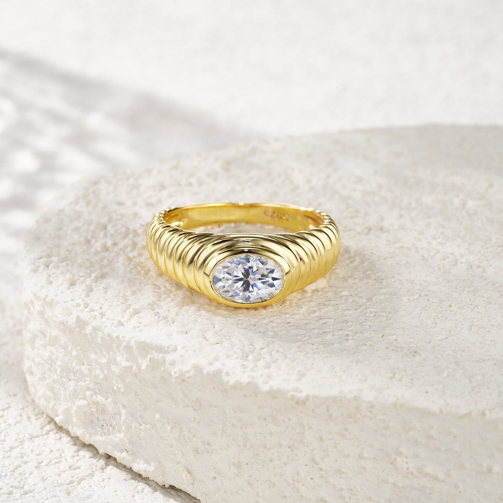 Gold Twisted Oval Halo Moissanite Ring