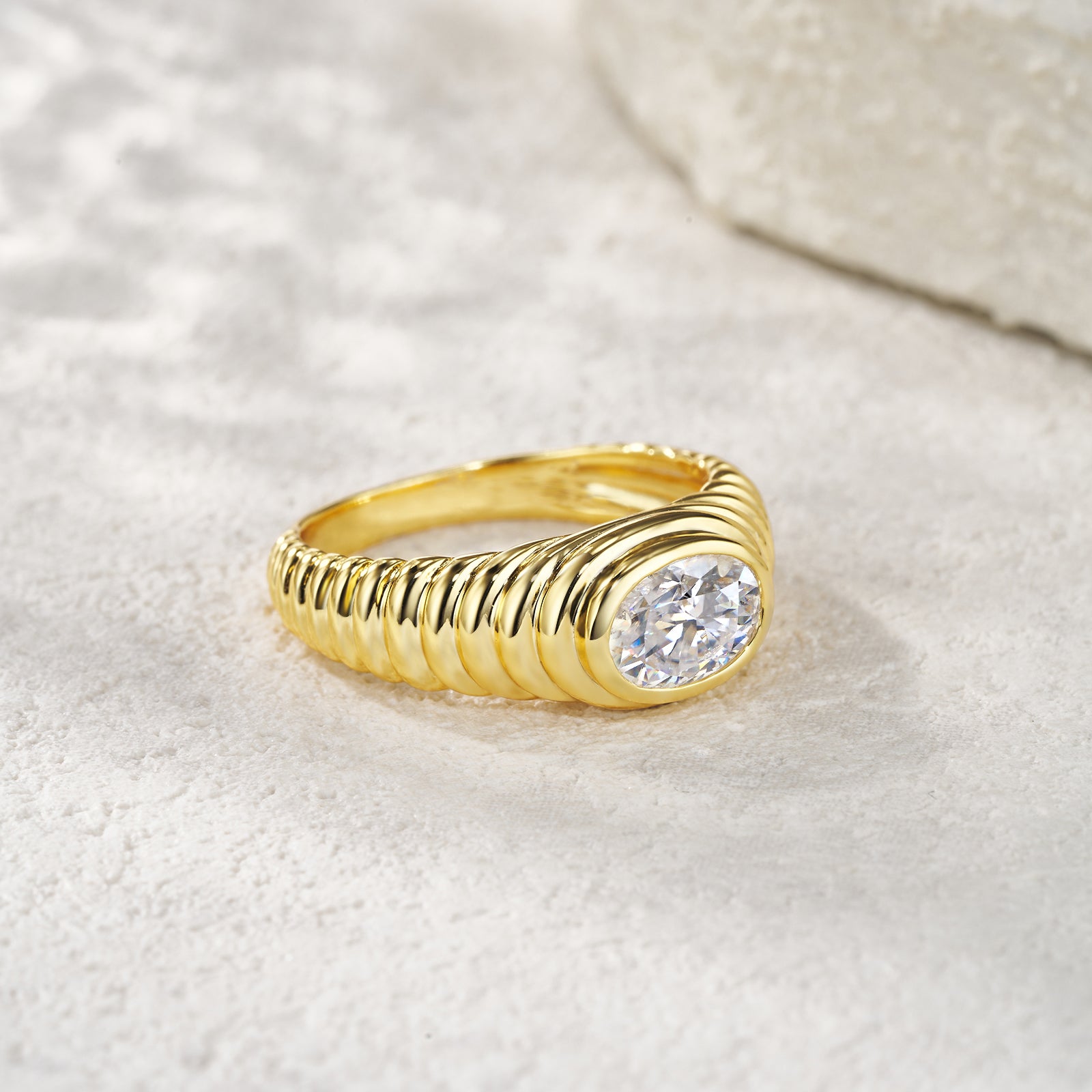 Gold Twisted Oval Halo Moissanite Ring