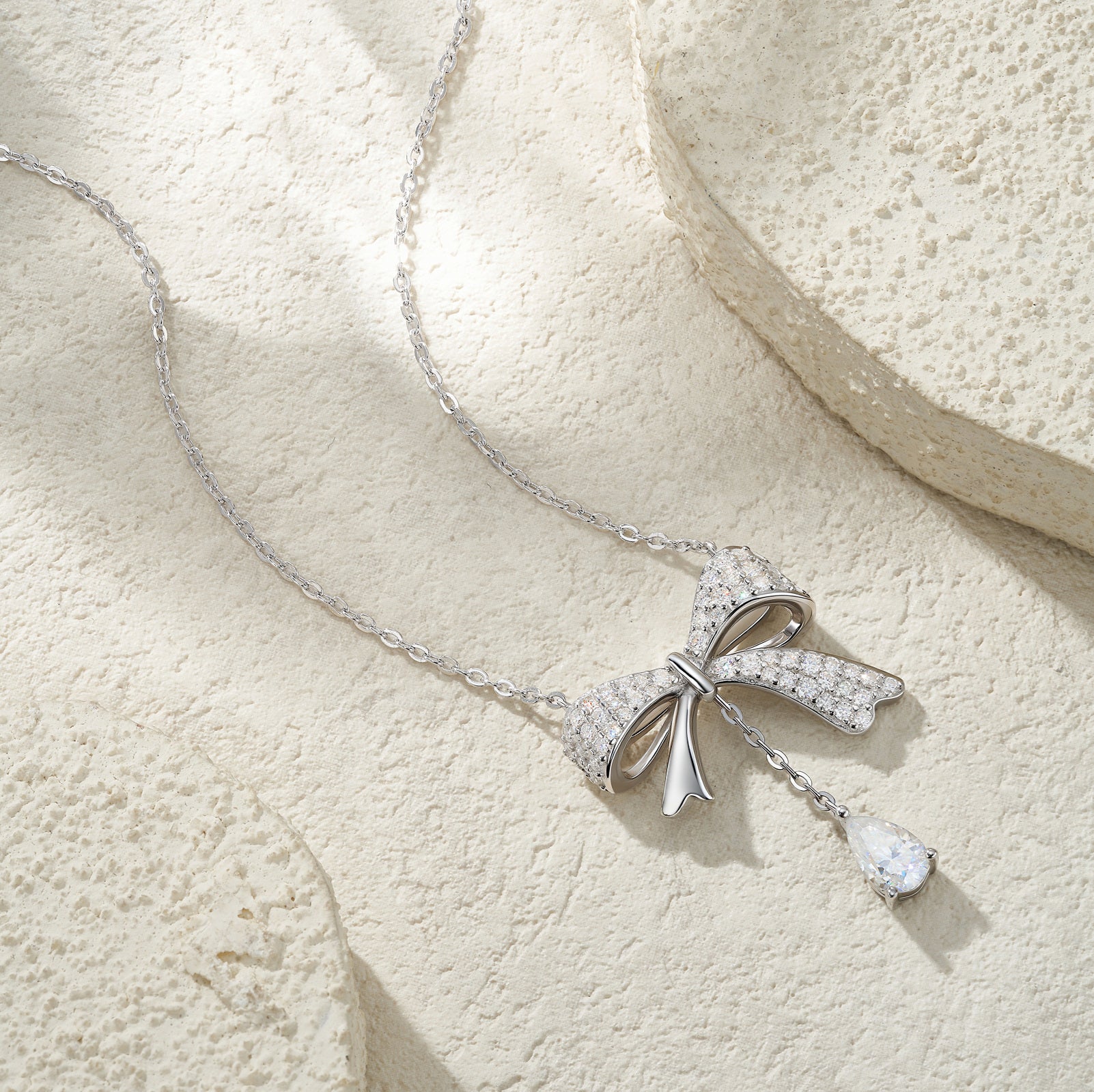 Ballet Bow Drop Pavé Pear Moissanite Necklace