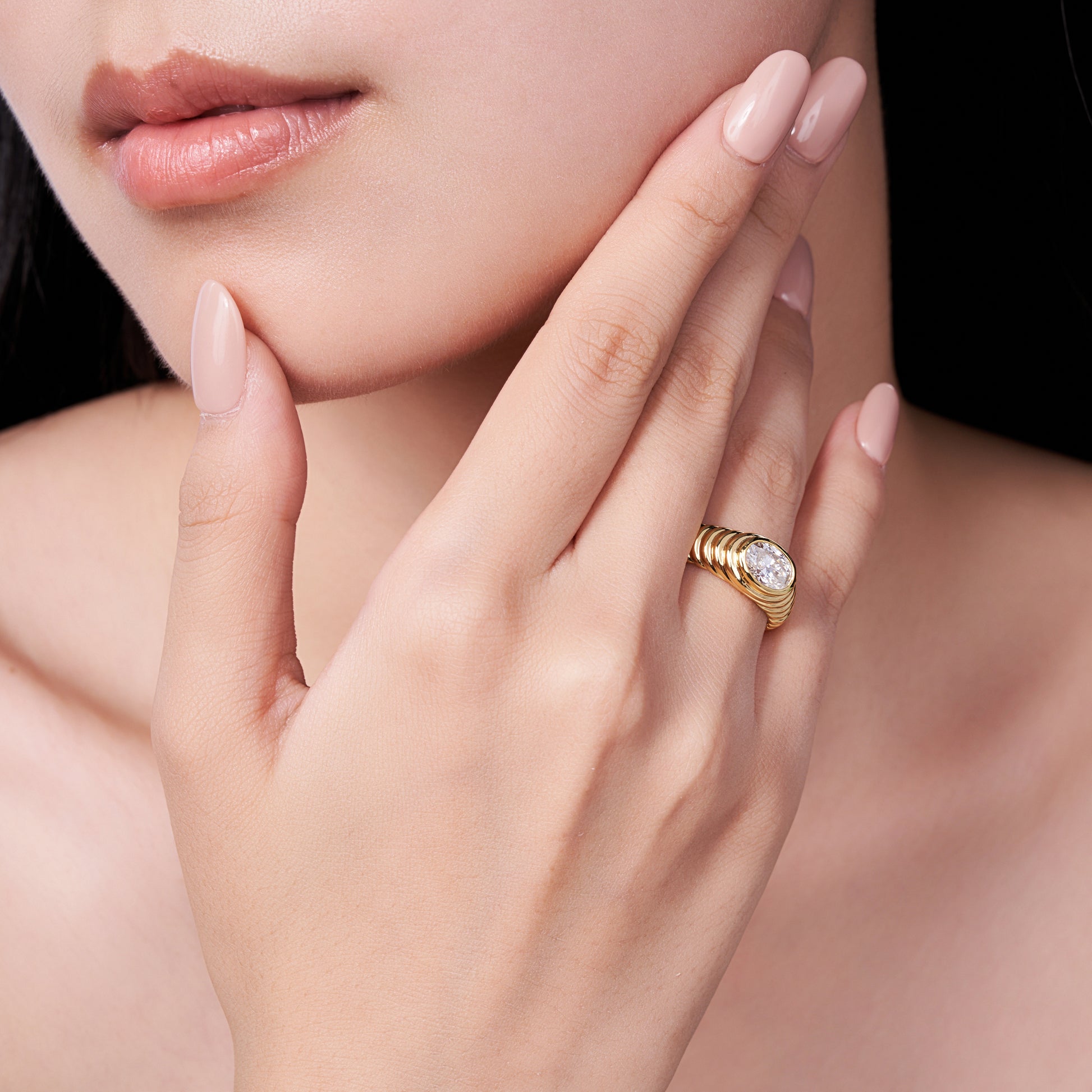 Gold Twisted Oval Halo Moissanite Ring
