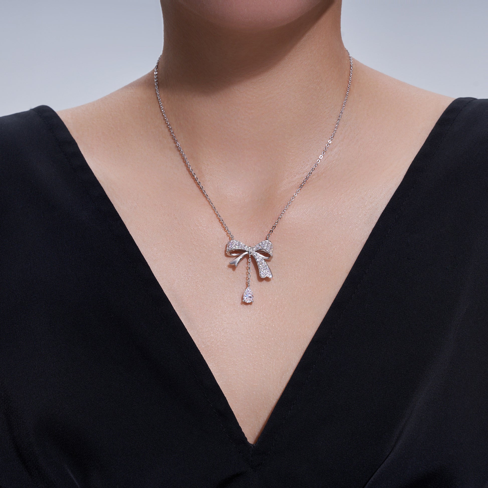 Ballet Bow Drop Pavé Pear Moissanite Necklace
