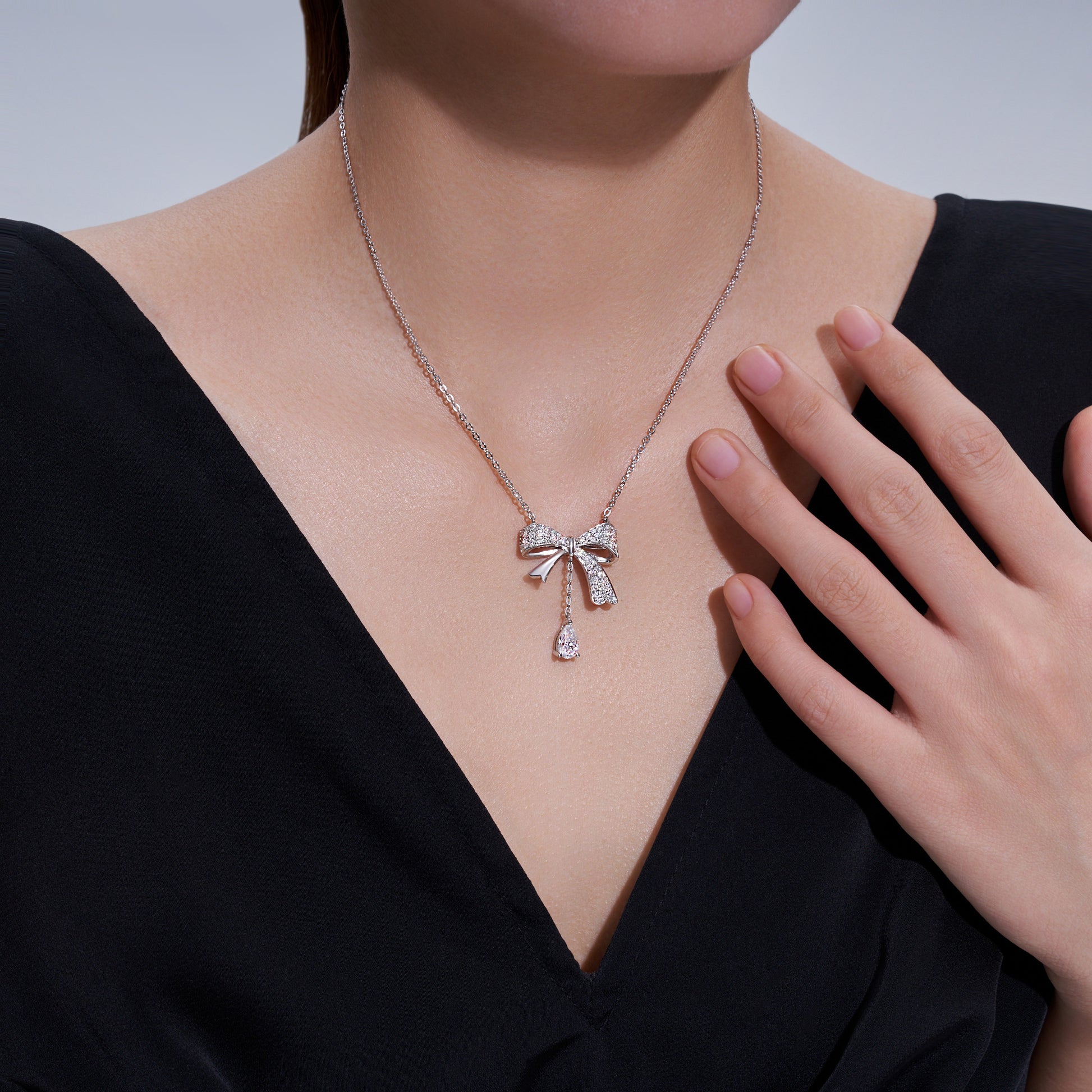 Ballet Bow Drop Pavé Pear Moissanite Necklace
