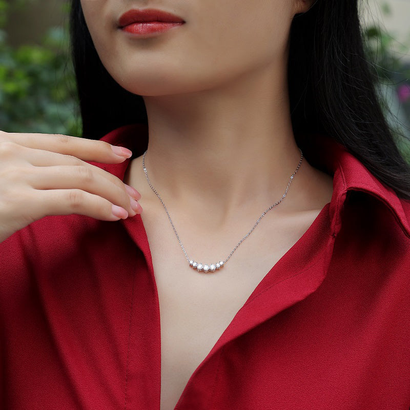 Curved Arc Prong-Set Round Moissanite Necklace