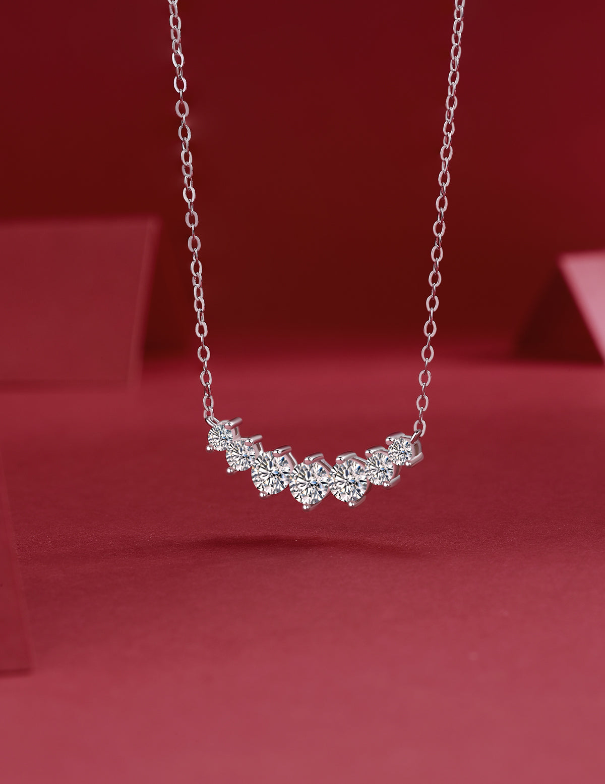Curved Arc Prong-Set Round Moissanite Necklace